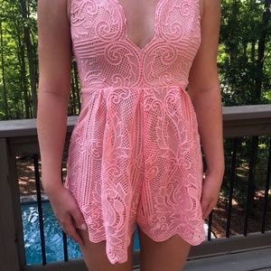 Apricot lace romper from Urban Outfitters